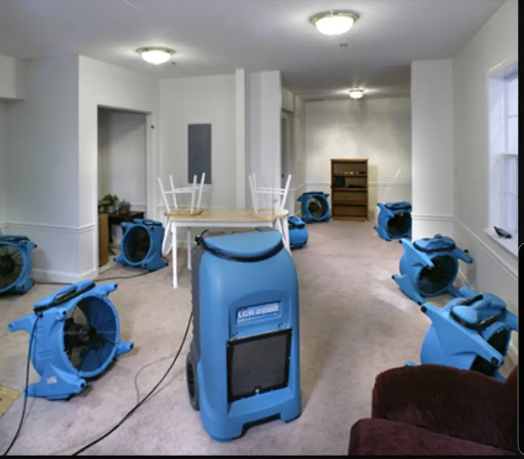 Air movers and dehumidifier setup for Water Damage Restoration in Clemson University